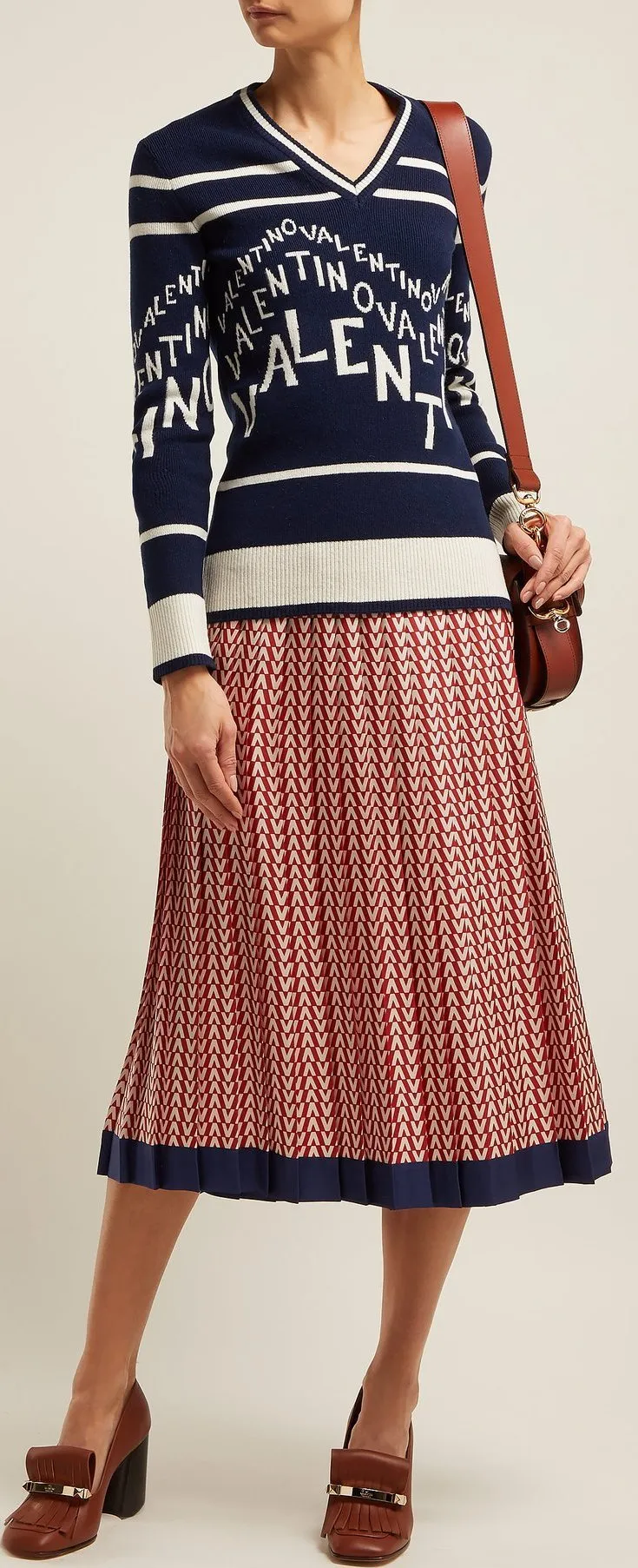 Logo Intarsia Sweater and Optical Print Pleated Midi Skirt