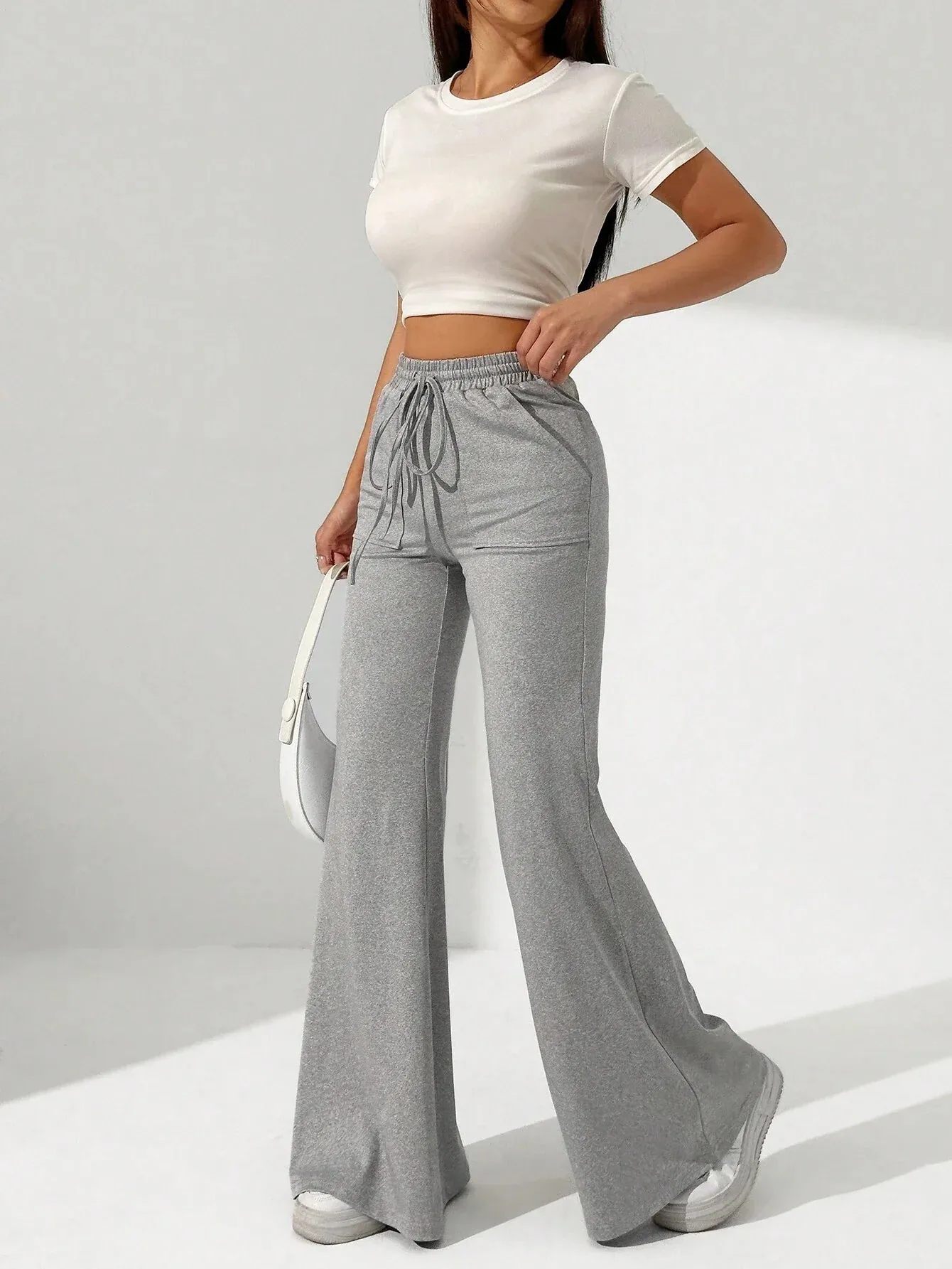 SOLID DRAWSTRING WAIST POCKET FLARE PANTS