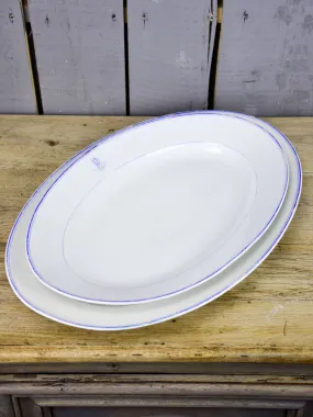 Two faïence platters with PL monogram